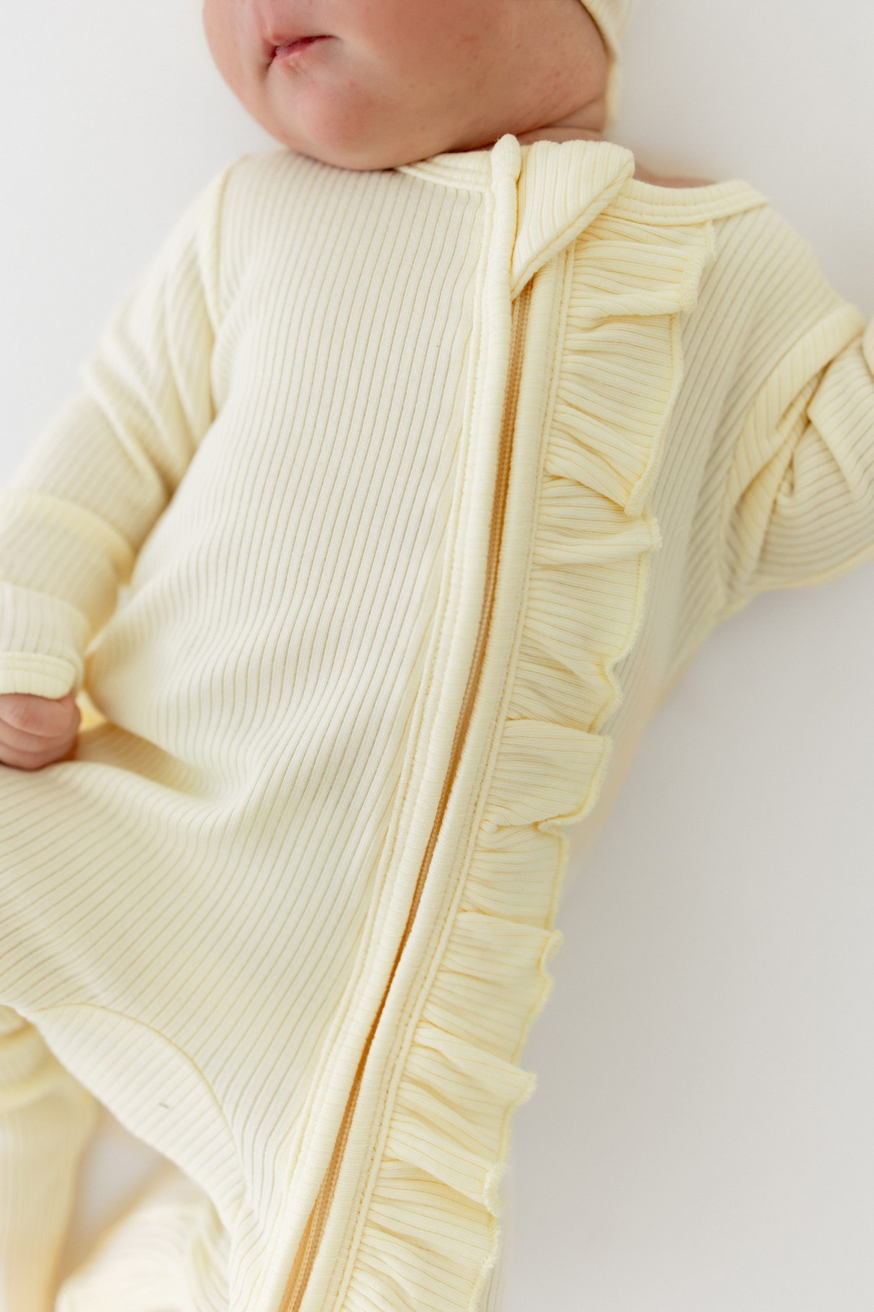 Ribbed Ruffle Zipper Footie in Chamomile - Image 3