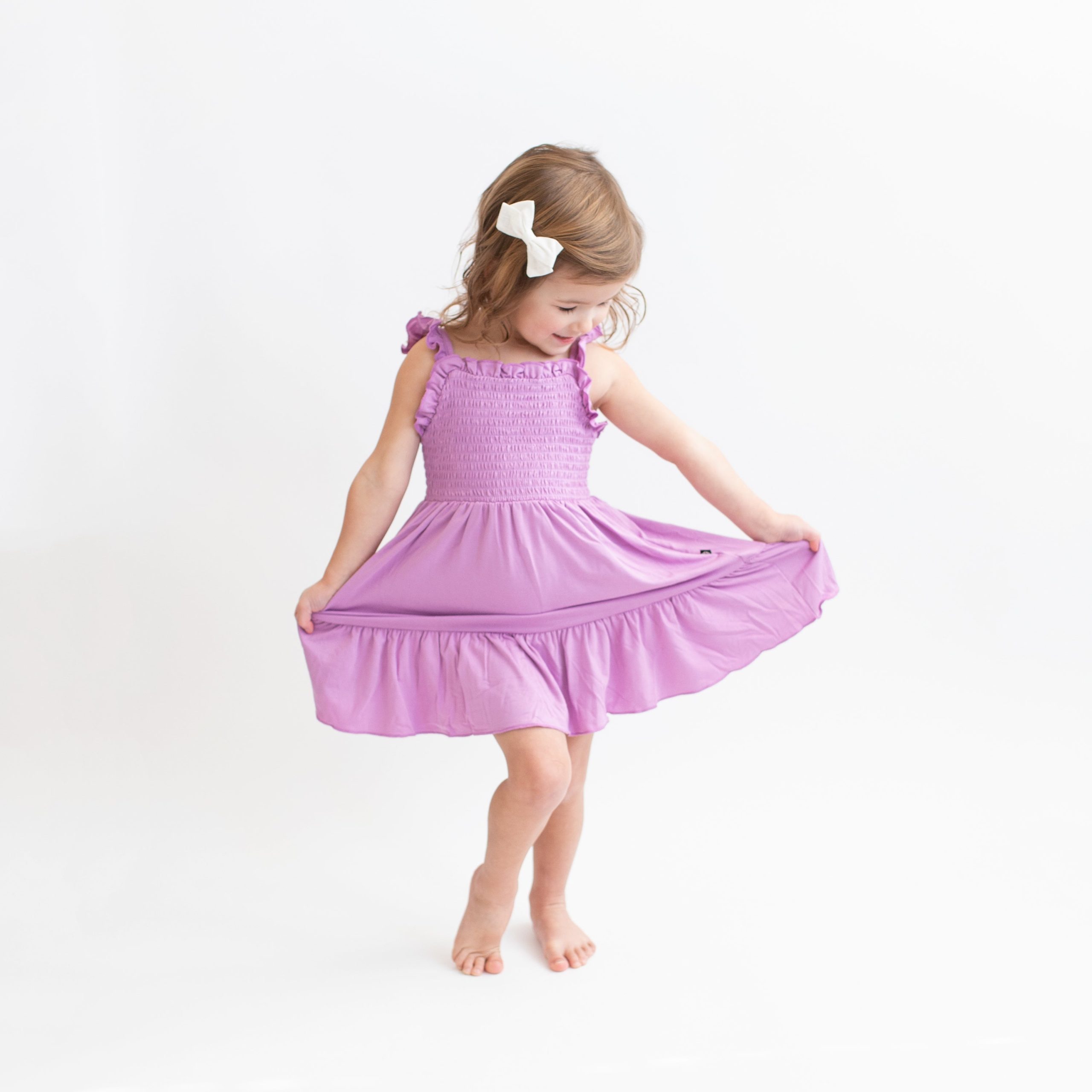Smocked Dress in Poi - Image 4